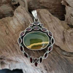 Sterling silver Owyhee Jasper and Garnet pendant.